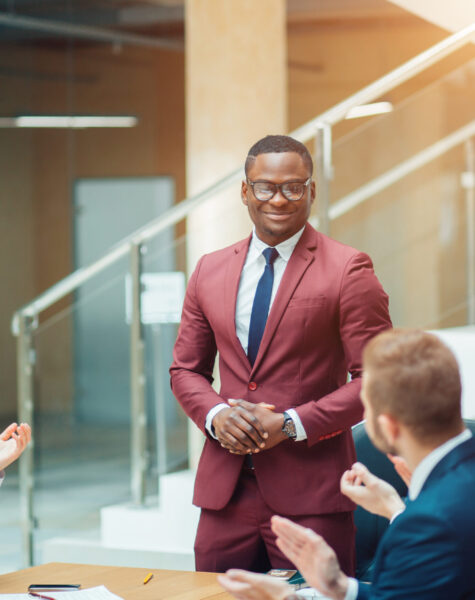 Young African American Business Man leading a team